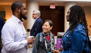 Three colleagues from the Cradle to Career Network join in a conversation