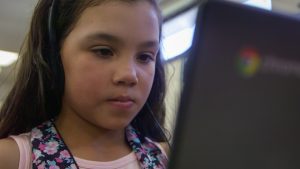 Young student using a laptop