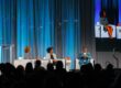 Jerelyn Rodriguez, co-founder and CEO of The Knowledge House, and Dr. Tim Lampkin, CEO of Higher Purpose Co., speak at the 2023 Cradle to Career Network Convening