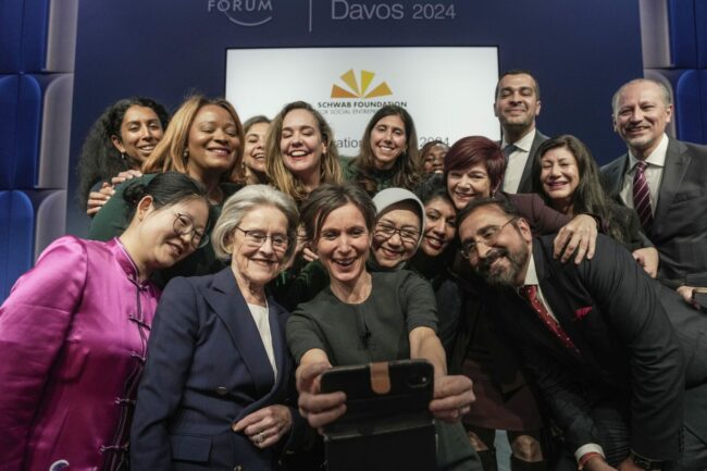 The recipients of the Schwab Foundation 2024 Social Innovation Awards pose for a selfie