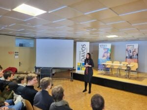 Jennifer Blatz speaks to a group of high school students in Switzerland