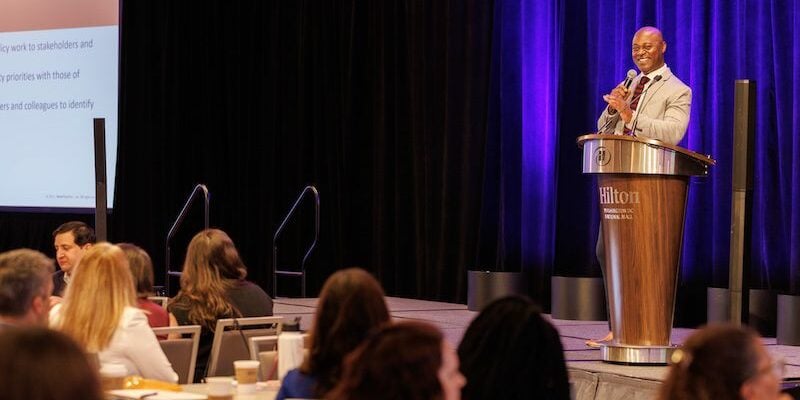 Josh Davis, vice president of policy and partnerships, speaks at the 2024 StriveTogether Policy Summit.